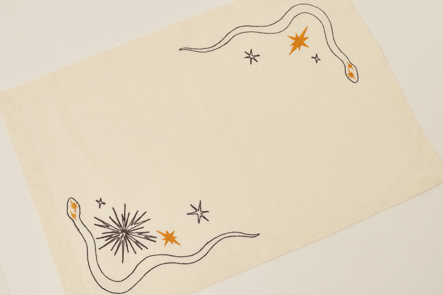 Set of embroidered placemats Snake