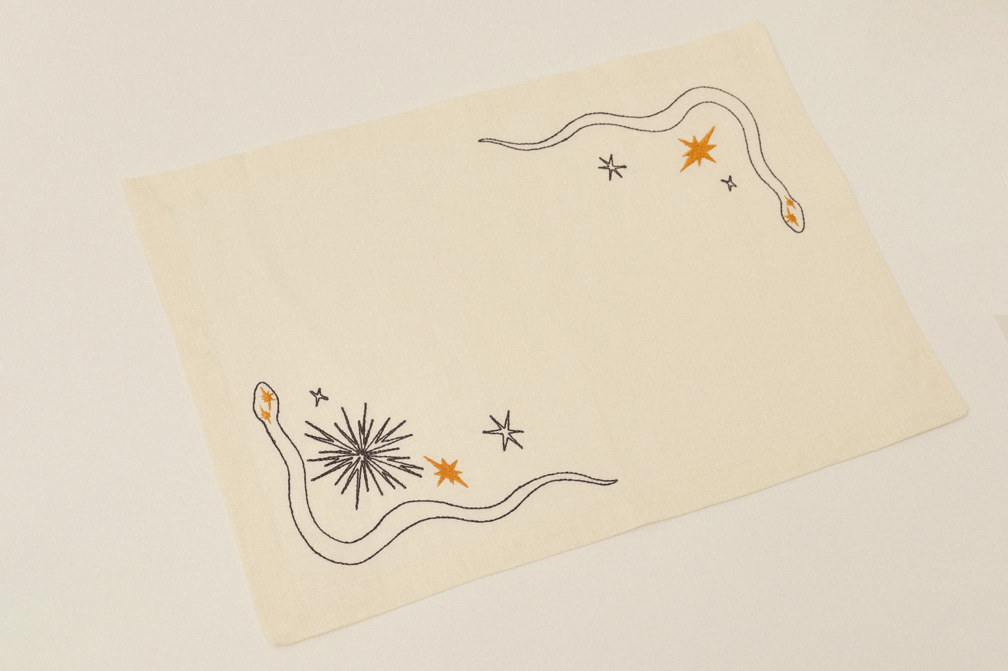 Set of embroidered placemats Snake